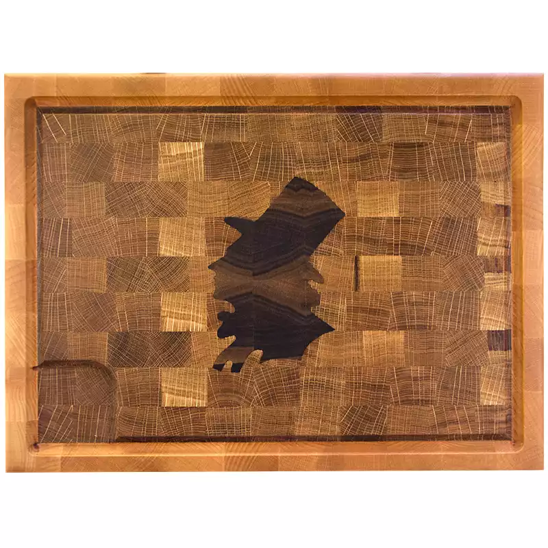 Skærebræt med HC Andersen i profil.